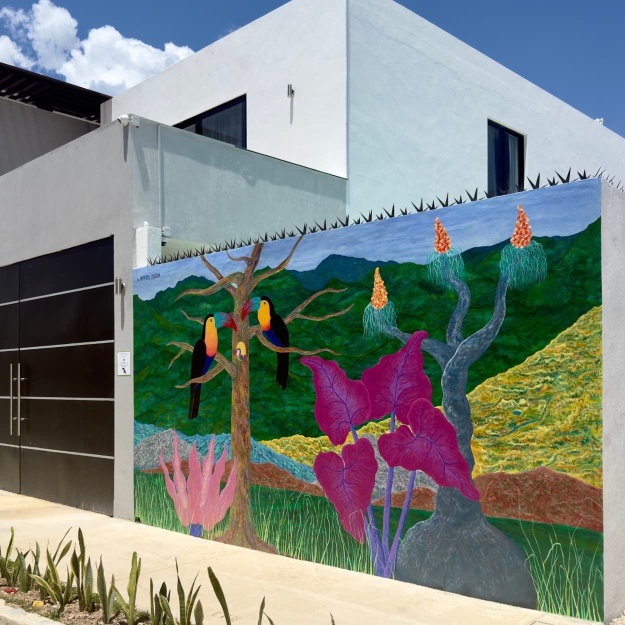 Mural on the exterior wall of an Airbnb Stay